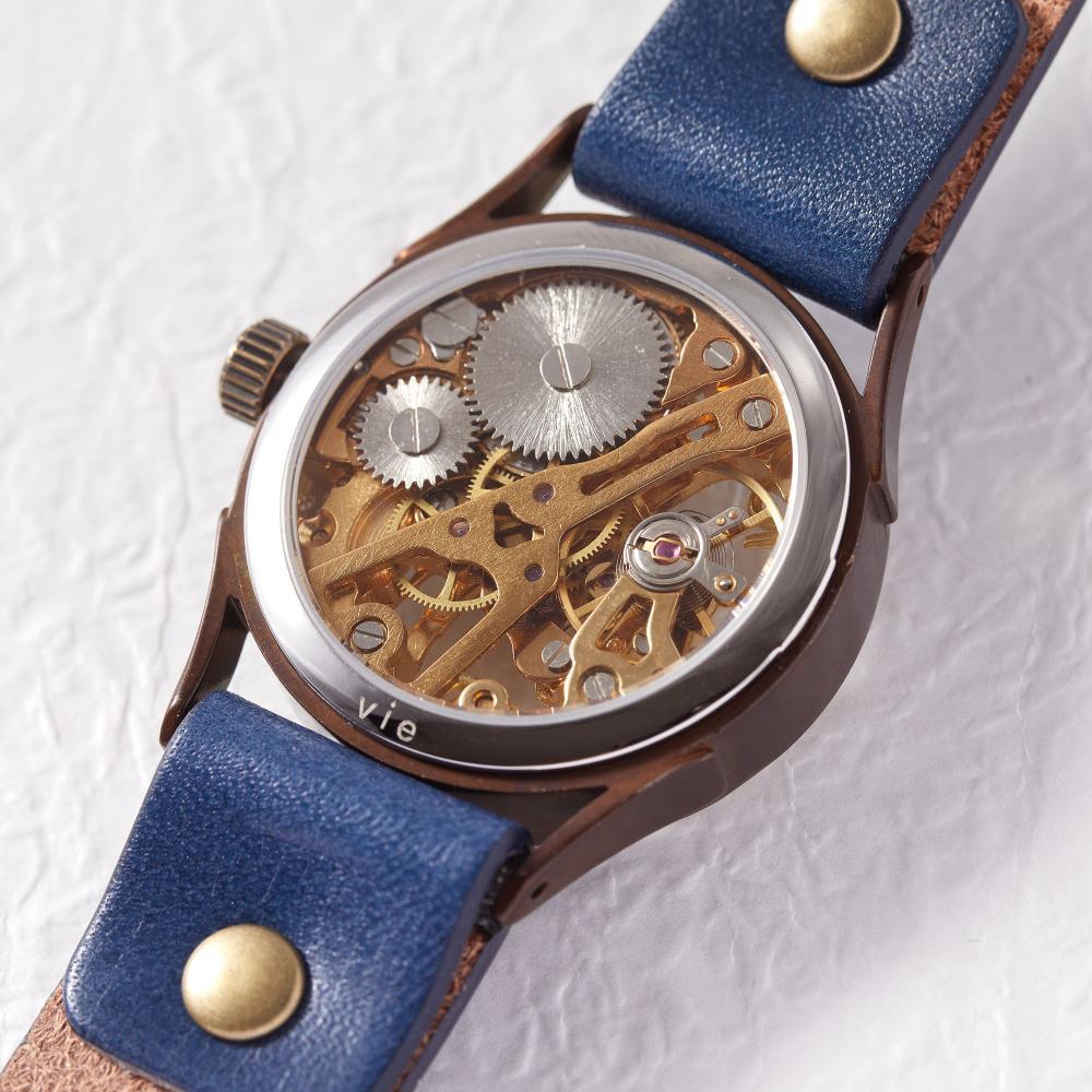 【ふるさと納税】機械-手巻き式ハンドメイドウォッチ　歯車の音色と動きが美しいスケルトンデザイン　ベルトカラー：茄子紺　WB044 茄子紺 サムネイル3